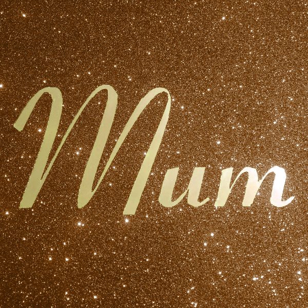 Gold mirror wording over the glitter