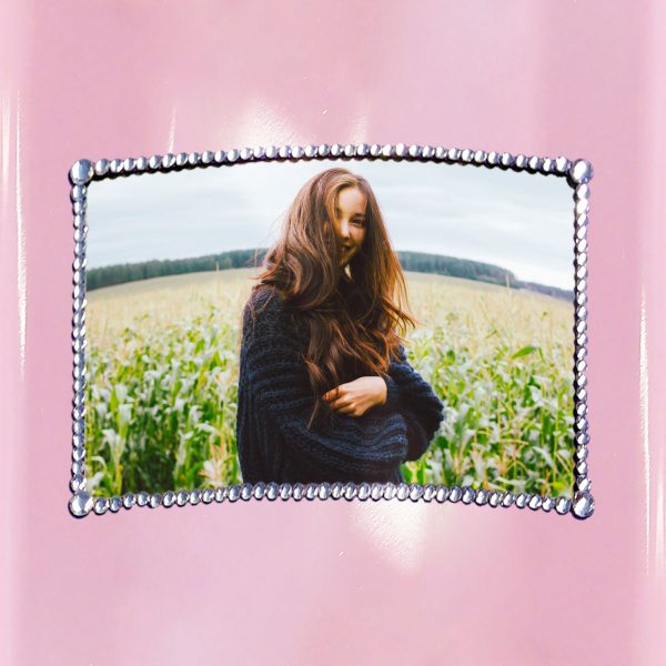 Picture decorated with crystals over the lid of the Devotion Crystal Pink American casket